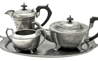 A Four Piece Utility Period Pewter Tea Set Including tray, tea pot, coffee/hot water pot and...