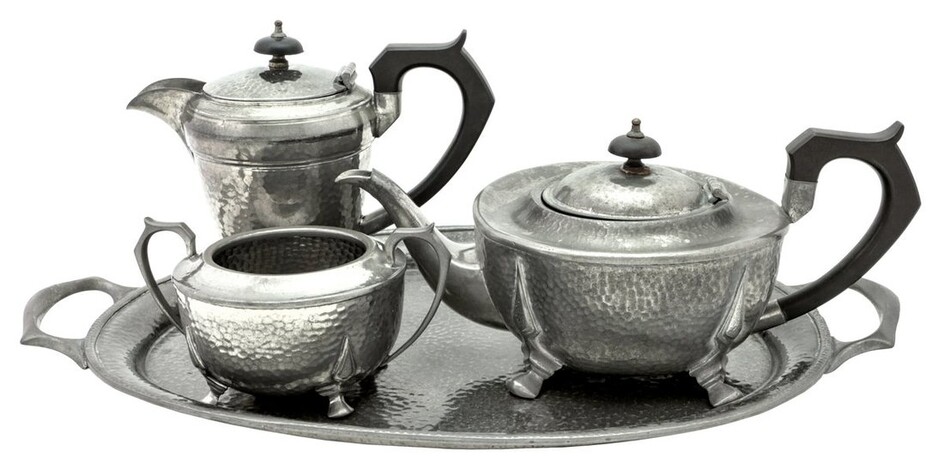 A Four Piece Utility Period Pewter Tea Set Including tray, tea pot, coffee/hot water pot and...