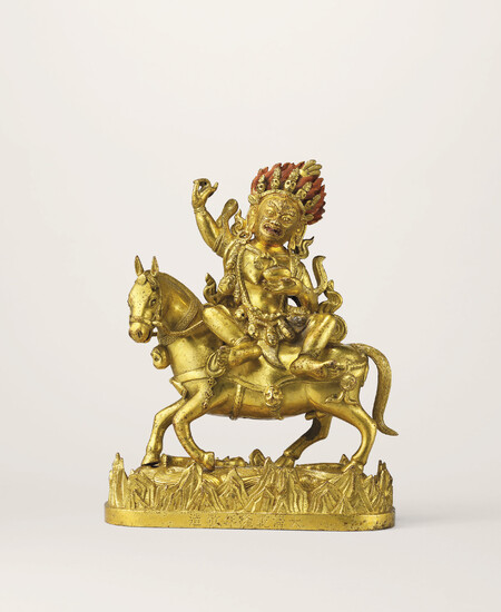 A GILT-BRONZE FIGURE OF PALDEN LHAMO, QIANLONG INCISED SEVEN-CHARACTER MARK AND OF THE PERIOD (1736-1795)
