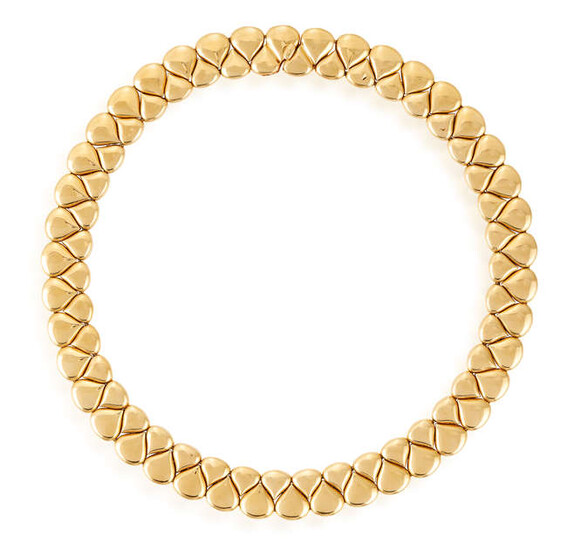 A GOLD NECKLACE, BY CHAUMET The collar set...