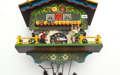 A GOOD WEST GERMAN CUCKOO CLOCK, WITH WEIGHTS AND PENDULUM, 30 CM HIGH