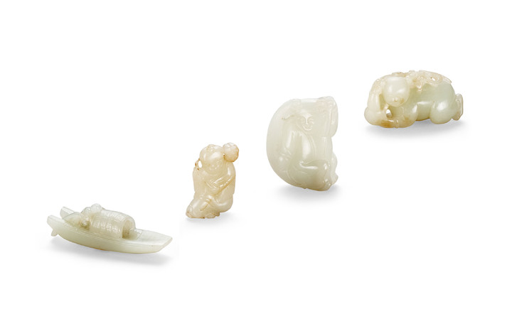 A GROUP OF FOUR WHITE JADE FIGURAL CARVINGS, QING DYNASTY (1644-1911)
