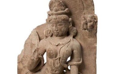 A Gandhara buff sandstone of a Bodhisattva,...