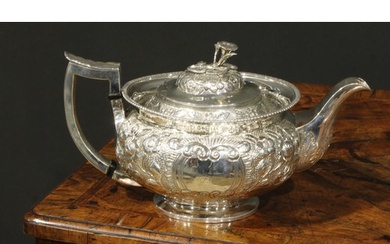 A George III Irish silver teapot, chased with chased with fl...