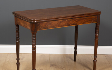 A George III fold over tea table