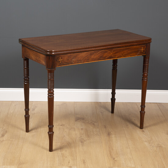 A George III fold over tea table