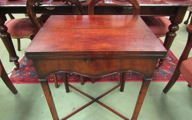 A George III revival mahogany lamp table, the double fold-ov...
