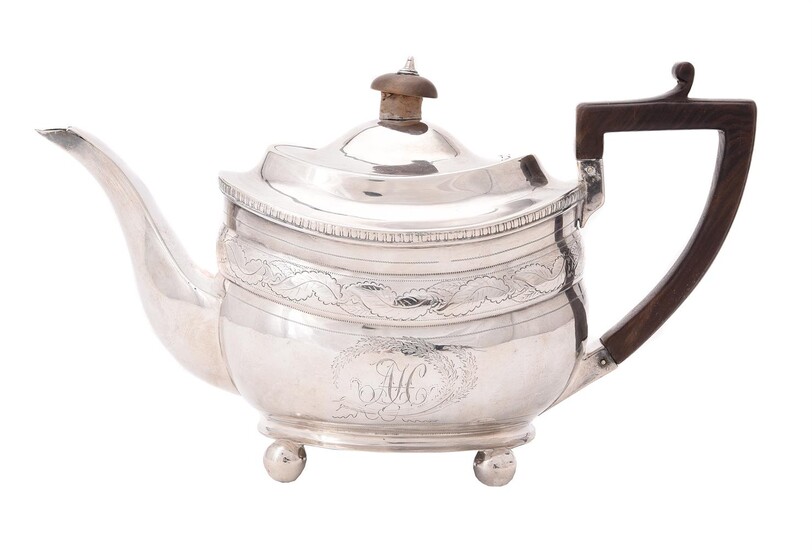 A George III silver oval tea pot
