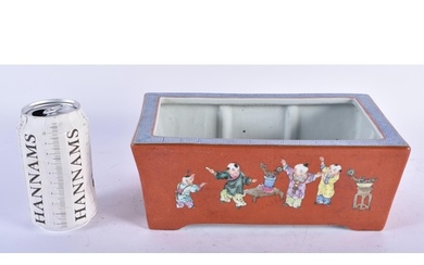 A LATE 19TH CENTURY CHINESE CORAL GROUND PORCELAIN PLANTER L...