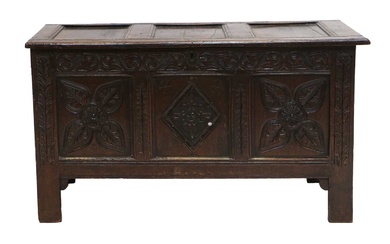 A Late 17th Century Joined Oak Chest, the moulded hinged...