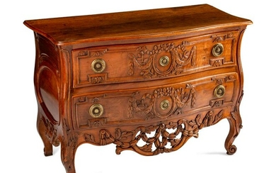 A Louis XV Provincial Carved Walnut Commode Height 35