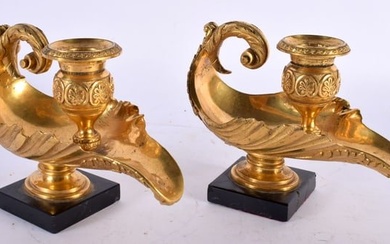 A PAIR OF EARLY 19TH CENTURY ENGLISH REGENCY ORMOLU OIL LAMPS modelled in the classical Romanesque m