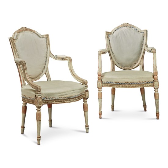 A PAIR OF GEORGE III POLYCHROME AND PARCEL GILT ARMCHAIRS, CIRCA 1775
