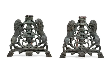 A Pair of Continental Cast Metal Andirons