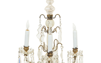 A Pair of Gilt Metal and Onyx Four Light Girondoles Hung with Cut Crystal Prisms