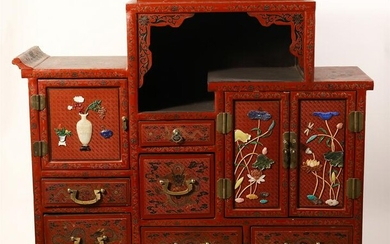 A RARE AND UNUSUAL CHINESE RED LACQUER CABINET WITH GEM