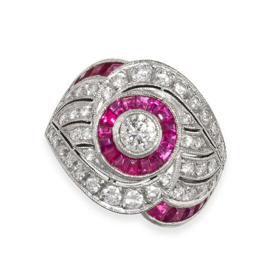 A RUBY AND DIAMOND DRESS RING in 18ct white gold, set