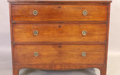 A Regency mahogany chest, first quarter 19th century, with three graduated drawers,...