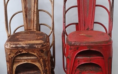 A SET OF EIGHT RUSTIC METAL STACKING CAFE CHAIRS