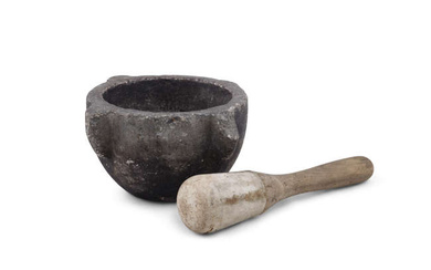 A STANDSTONE PESTLE AND MORTAR, the pestle with pine...