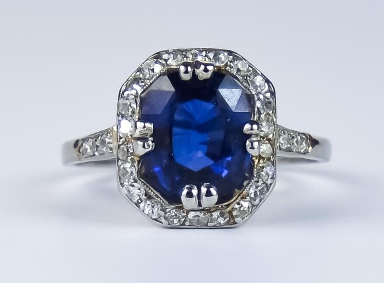 A Sapphire and Diamond Ring, Modern, white coloured metal,...