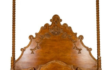 A Spanish Colonial Style Carved Walnut Bed Headboard