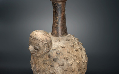 A Spouted Globular Bottle with Anthro-Zoomorphic Representation, Chavin, Peru, 900-200 BCE