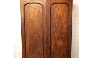 A Victorian mahogany double wardrobe, the cavetto cornice ov...