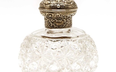 A William Commyns silver topped cut glass perfume bottle