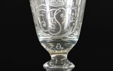 A Wine Glass, circa 1730, the rounded funnel bowl engraved...