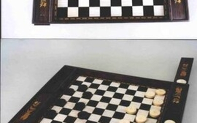 A fine late 18th century checkerboard and checkers
