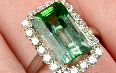 A green tourmaline and brilliant-cut diamond cluster ring.