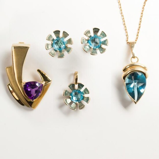 A group of blue topaz or amethyst jewelry
