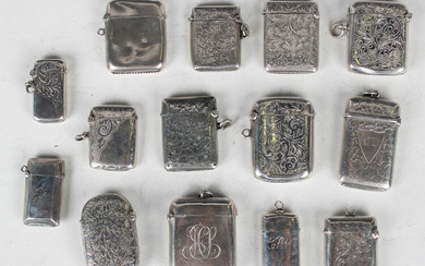 A group of fourteen silver vesta cases, the majority with engraved decoration, including one with fe