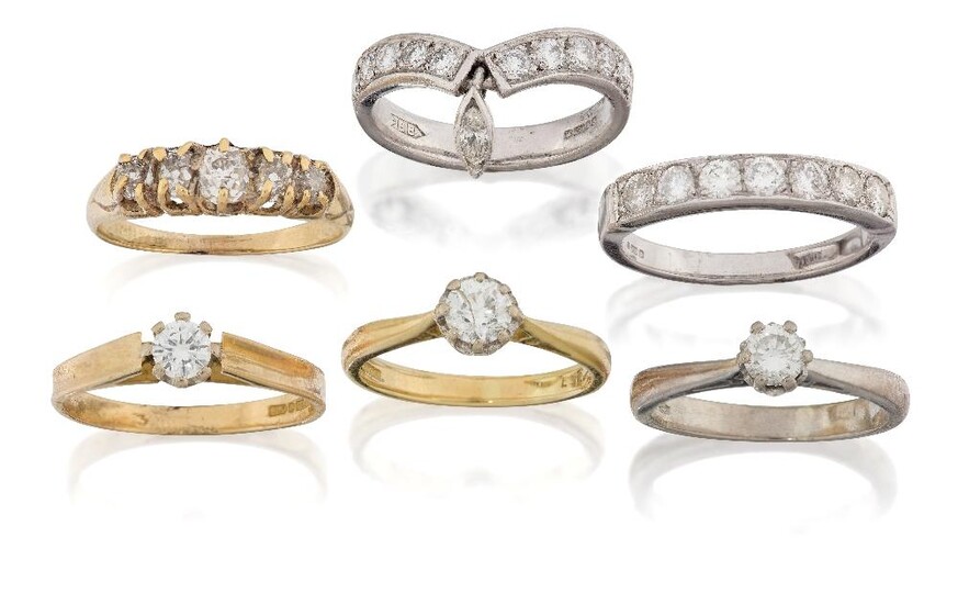 A group of six diamond rings comprising: three 18ct gold diamond single stone rings, each claw set with a brilliant-cut diamond, the white gold example with diamond weighing approx. 0.25 carats, size approx. L, one yellow gold example with diamond...