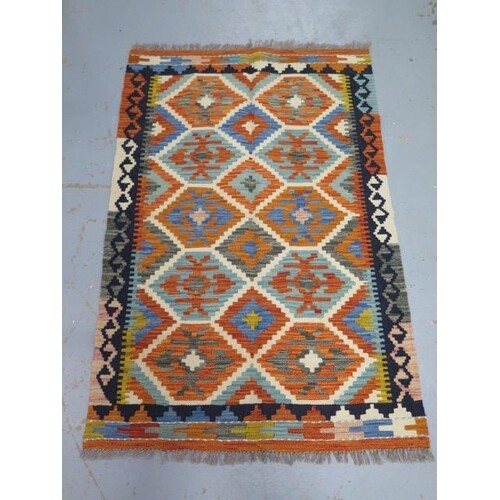A hand knotted woollen Chobi Kilim rug, 125cm x 81cm
