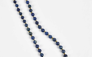 A lapis lazuli beaded necklace with silvered metal clasp.Condition Report...