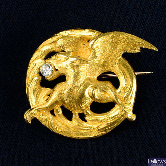 A late Victorian Art Nouveau 18ct gold griffin brooch, with old-cut diamond highlight.