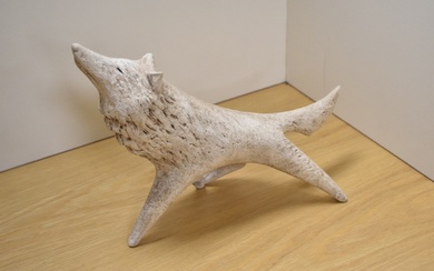 A limited edition Paul Smith ceramic sculpture of a stretching wolf, signed, numbered 1/20 and dated