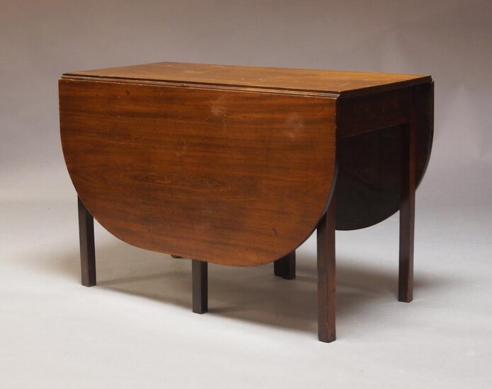 A mahogany drop leaf dining table, late 19th, early 20th Century, the rounded rectangular top on square section supports, 72cm high, 155cm wide, 109cm deep Provenance: Property of Future PLC, removed from the offices of Country Life magazine.