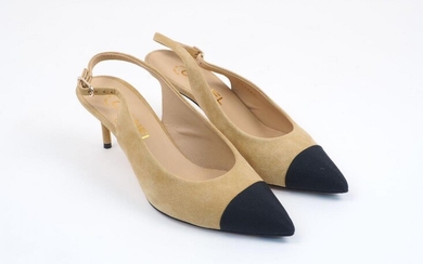 A pair of Chanel sling-back heeled pumps, designed in beige...