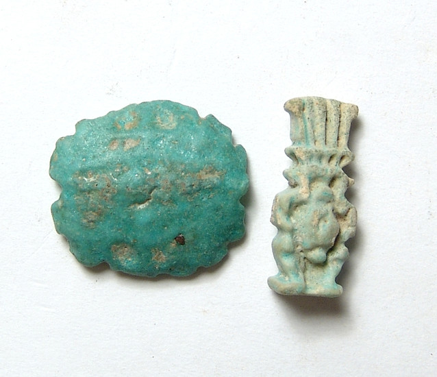 A pair of Egyptian faience amulets, Late Period