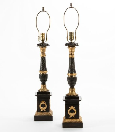 A pair of French bronze table lamps