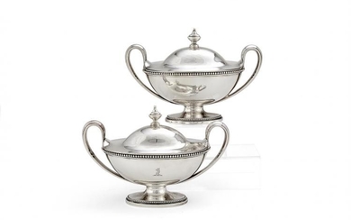 A pair of George III silver navette shape sauce tureens and covers by John Schofield
