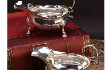 A pair of George III silver sauce boats, acanthus-capped fly...