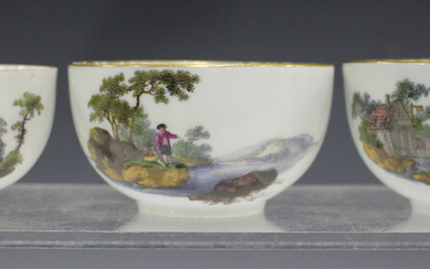 A pair of Meissen teabowls, Dot period, circa 1760-70, painted to the exterior with opposing landsca