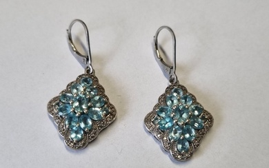 A pair of Silver gem set Earrings.