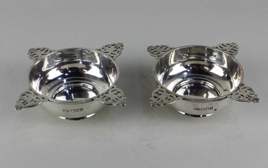 A pair of Victorian silver circular cruets