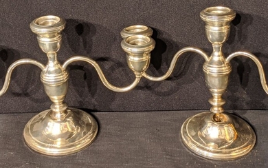 A pair of Westmorland sterling silver twin branch candlesticks,...