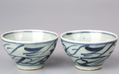 A pair of blue and white tea cups, 19th century